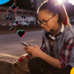 girl outside on tiktok on her phone