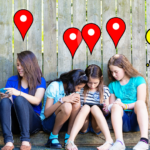 Five young teens watching smartphones along a fence with location pin graphics above their heads and a snapchat thought bubble