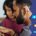 father and daughter looking at phone together with social media icons to the right