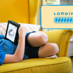 child on yellow sofa using a slow internet device