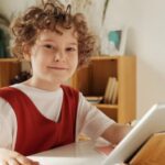 Child using YouTube on tablet