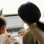 Mom and daughter doing homework together