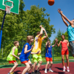 Group of kids playing basketball outside