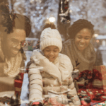 Family looking in shop window