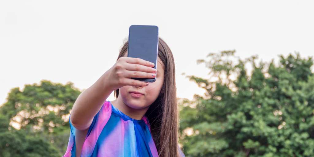 Child taking selfie