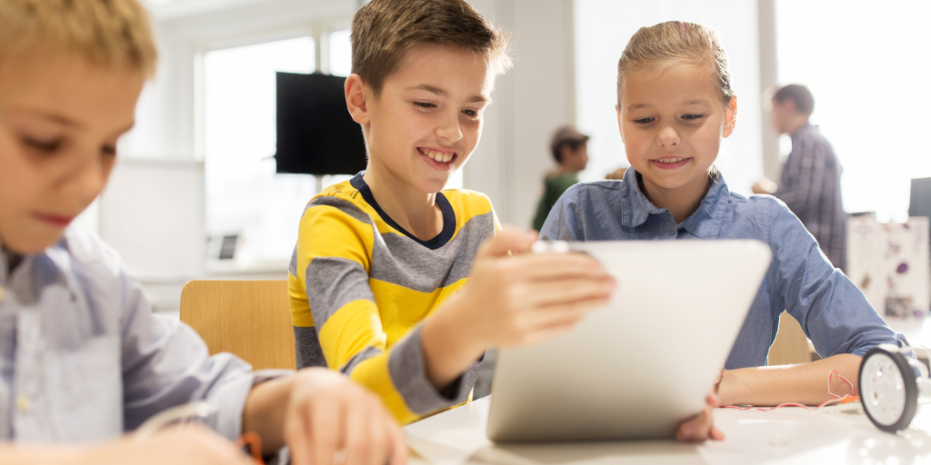 Children looking at tablet