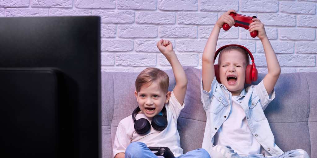 Two kids playing Fortnite
