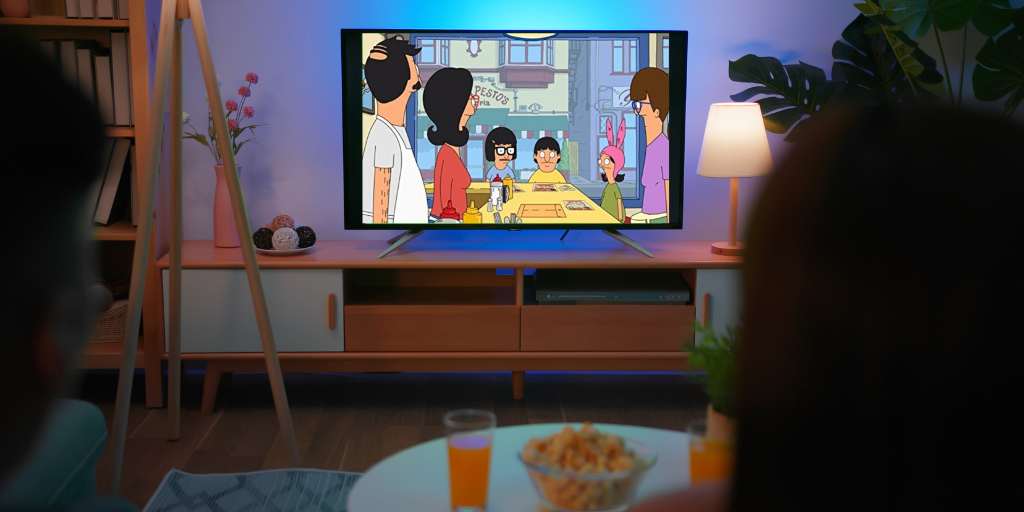 Family watching Bob's Burgers at home