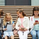 group of kids using safe messenger apps