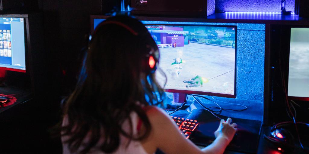Girl playing MMO online multiplayer game