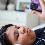 Teen looking at Discord on phone