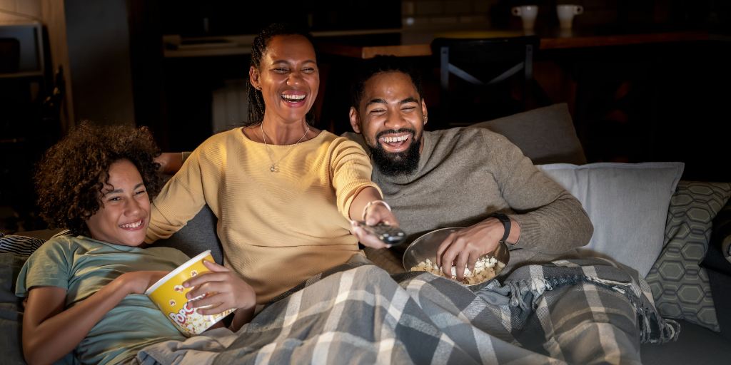 Family watching movies together