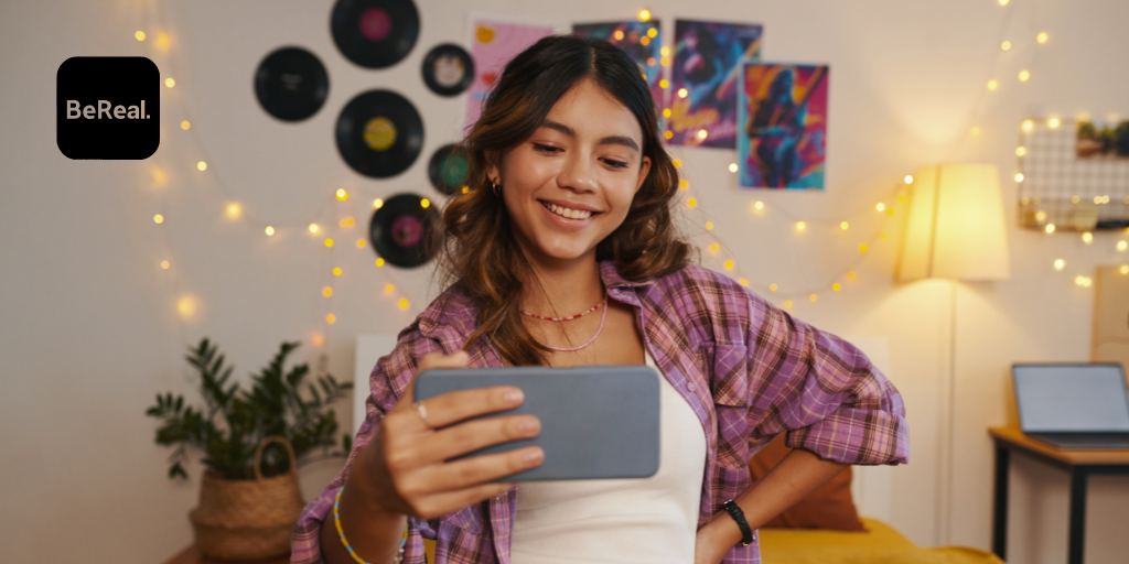 Teen girl using BeReal app
